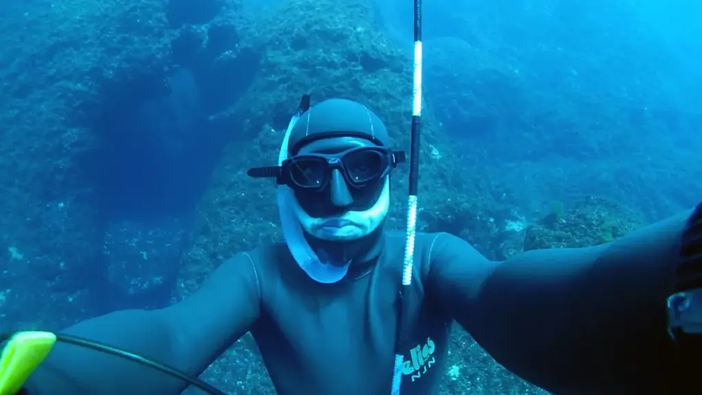 a free diver under the sea